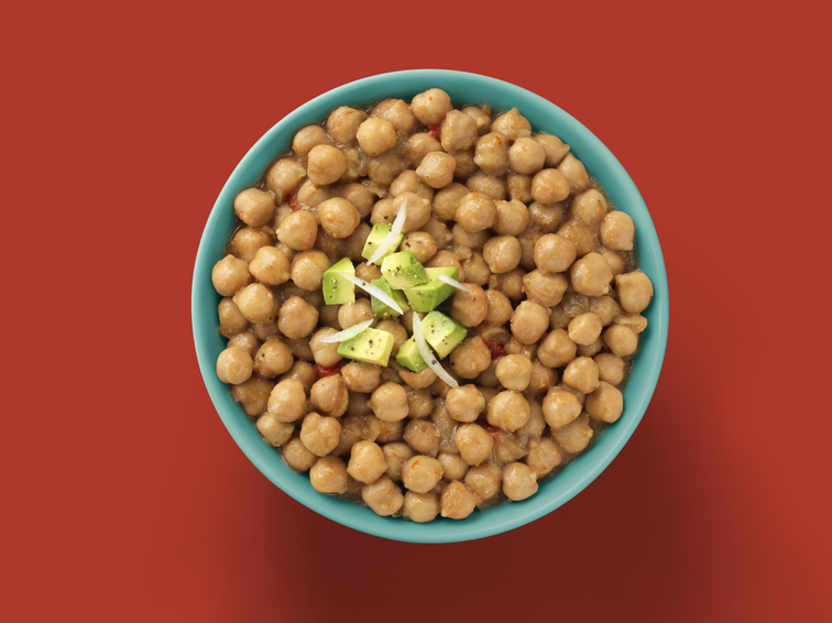 Load image into Gallery viewer, A bowl of beans with avocado. 
