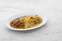 Load image into Gallery viewer, A delicious plate full of Peruvian Lentils Sofrito. 
