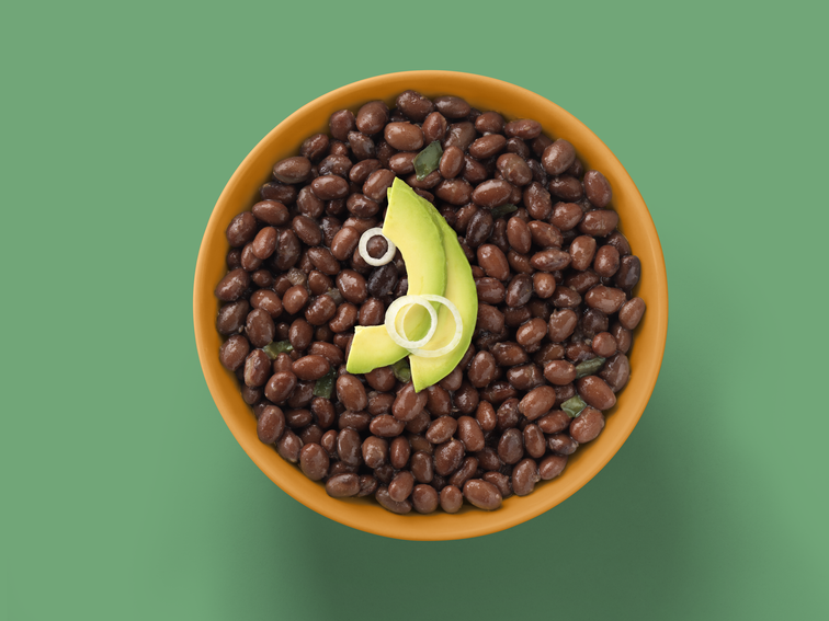 Load image into Gallery viewer, A bowl of beans, onion, and avocado. 
