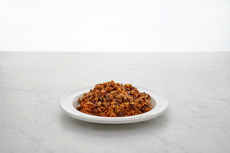 Load image into Gallery viewer, A tasty plate of Fillo&#39;s Puerto Rican Rice &amp; Gandules Sofrito.
