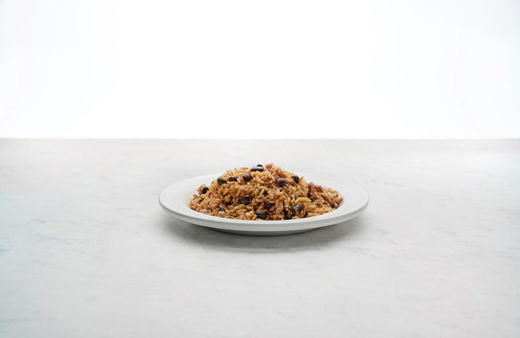 Load image into Gallery viewer, A plate of Fillo&#39;s Cuban Congri Sofrito. 
